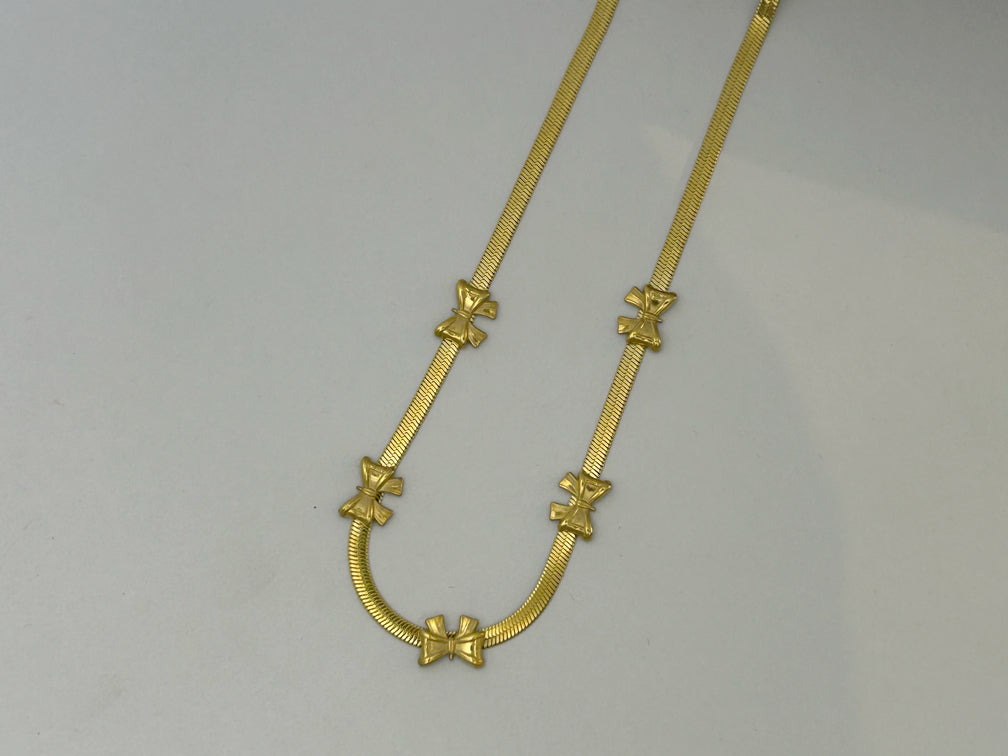 Golden Bow Charm necklace