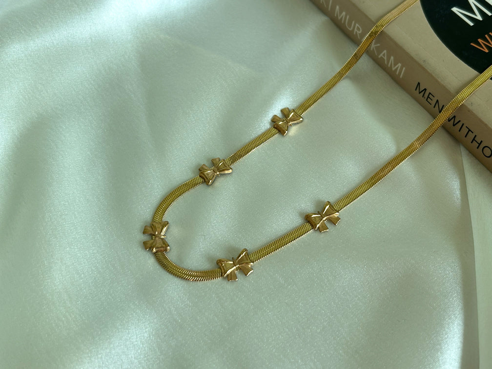 Golden Bow Charm necklace